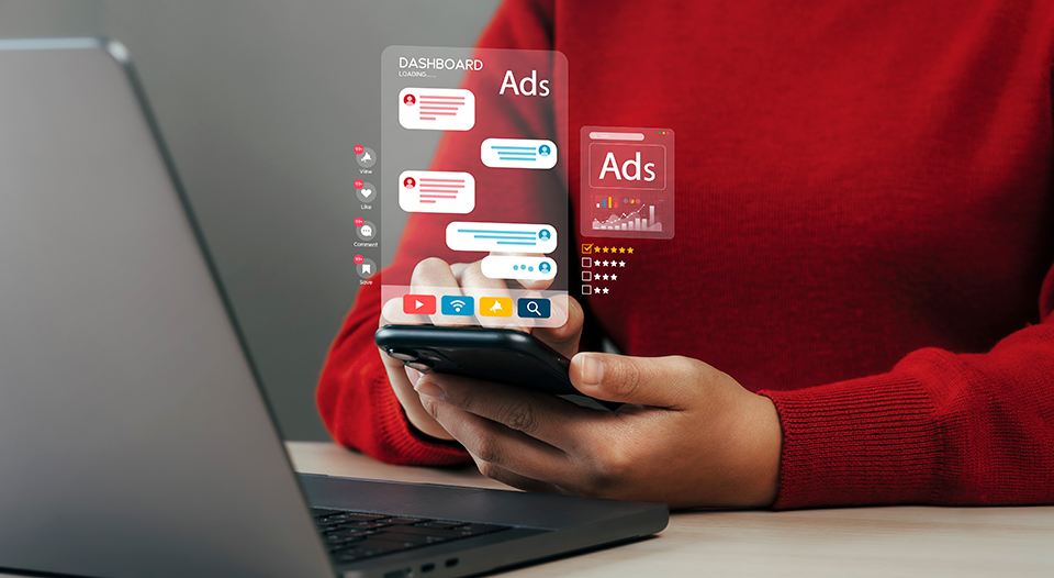 person watching advertisements on a cell phone.