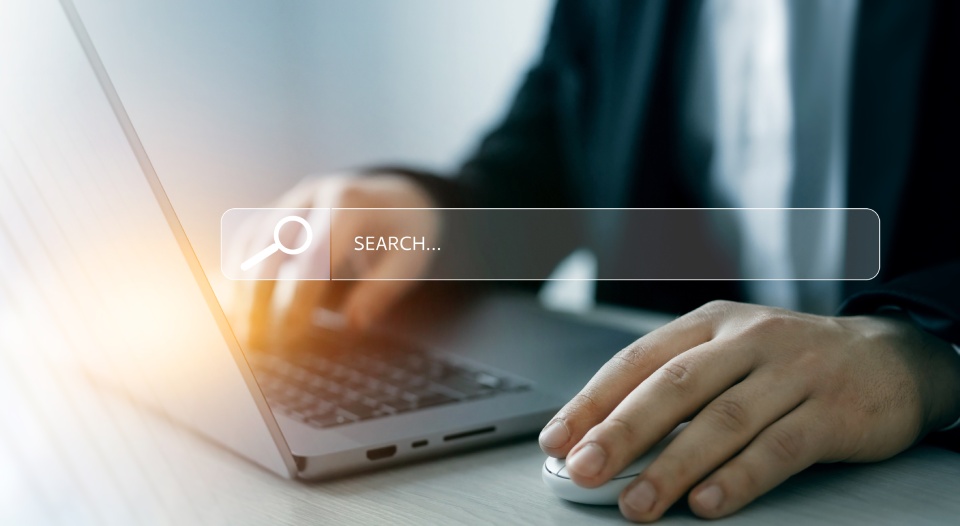 Person clicking internet search page on touch screen. Searching information on internet. SEO searching.